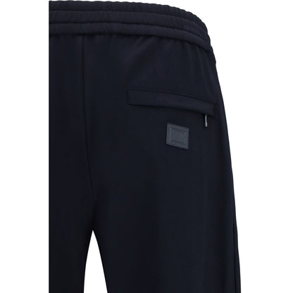 Activewear Pants by Dolce & Gabbana for men in stretch polyamide blue features an versatile silhouette, integrating performance-ready with a versatile athletic & regular-fit, long, and .