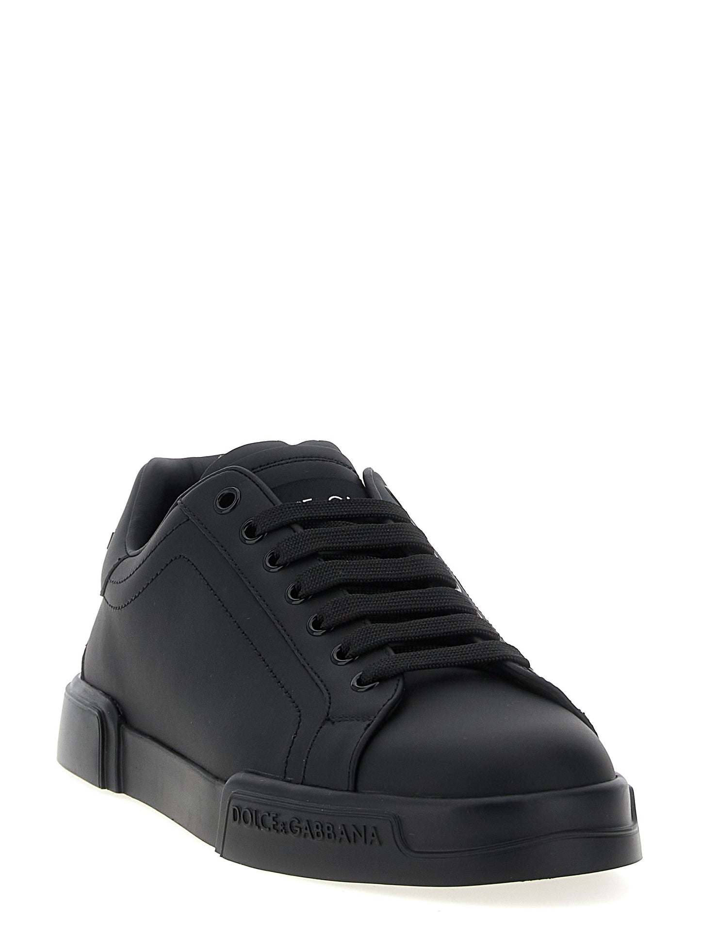 Sneakers by Dolce & Gabbana for men in calfskin leather black presents a impeccable silhouette as Men's Low Top Calfskin Leather Sneakers, expertly defined by a impeccable low-top style for a impeccable, high-fashion look.
