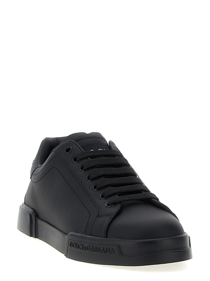 Sneakers by Dolce & Gabbana for men in calfskin leather black presents a impeccable silhouette as Men's Low Top Calfskin Leather Sneakers, expertly defined by a impeccable low-top style for a impeccable, high-fashion look.