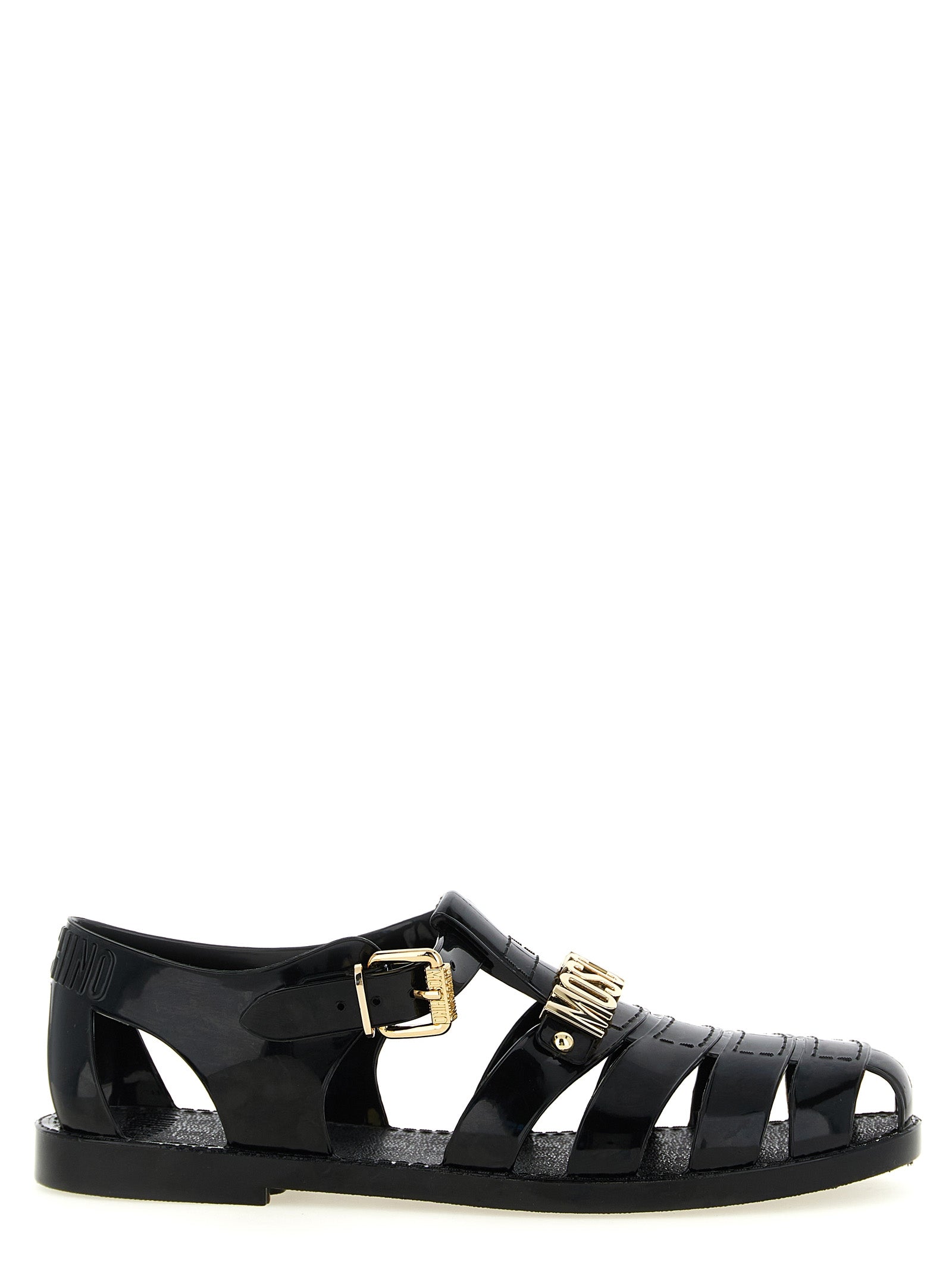 Flat Ankle Strap Cage Fisherman Sandals by Moschino for men in pvc black & gold features an statuesque Men's PVC Flat Ankle Strap Cage Fisherman Sandals silhouette with a refined flat and elegant .