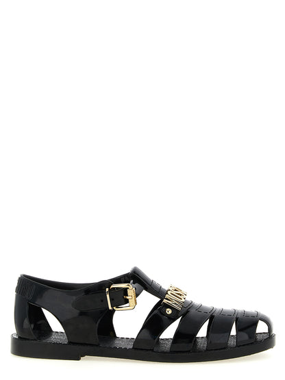 Flat Ankle Strap Cage Fisherman Sandals by Moschino for men in pvc black & gold features an statuesque Men's PVC Flat Ankle Strap Cage Fisherman Sandals silhouette with a refined flat and elegant .
