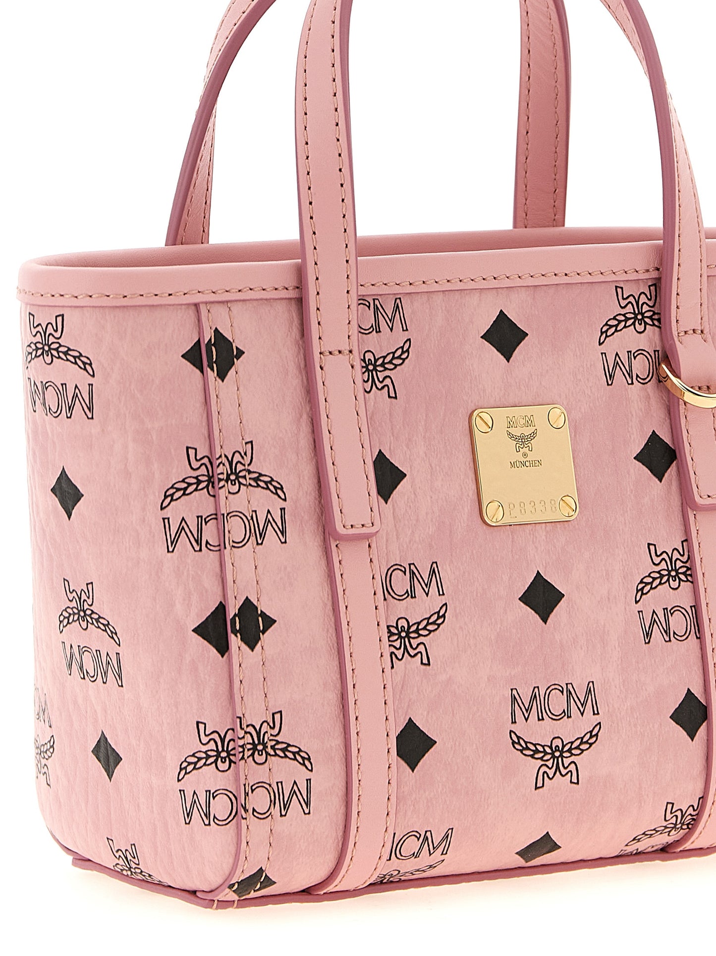 Mni Tote Bag by MCM for women in polyester polyethylene polyurethane leather gold, multicolor, natural, pink, patterned & monogram features a urban sophisticate Visetos Polyester Polyethylene Polyurethane Leather Mni Tote Bag design with a secure zipper, ample built-in-compartments & cardholder, and versatile shoulder-strap, handle, adjustable-strap & detachable-strap for a urban sophisticate finish.