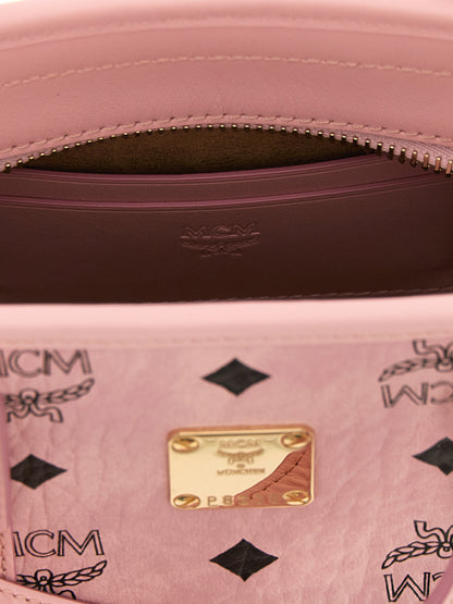 Mni Tote Bag by MCM for women in polyester polyethylene polyurethane leather gold, multicolor, natural, pink, patterned & monogram showcases a urban-chic Visetos Polyester Polyethylene Polyurethane Leather Mni Tote Bag design, featuring a secure zipper, ample built-in-compartments & cardholder, and versatile shoulder-strap, handle, adjustable-strap & detachable-strap for a urban-chic finish.