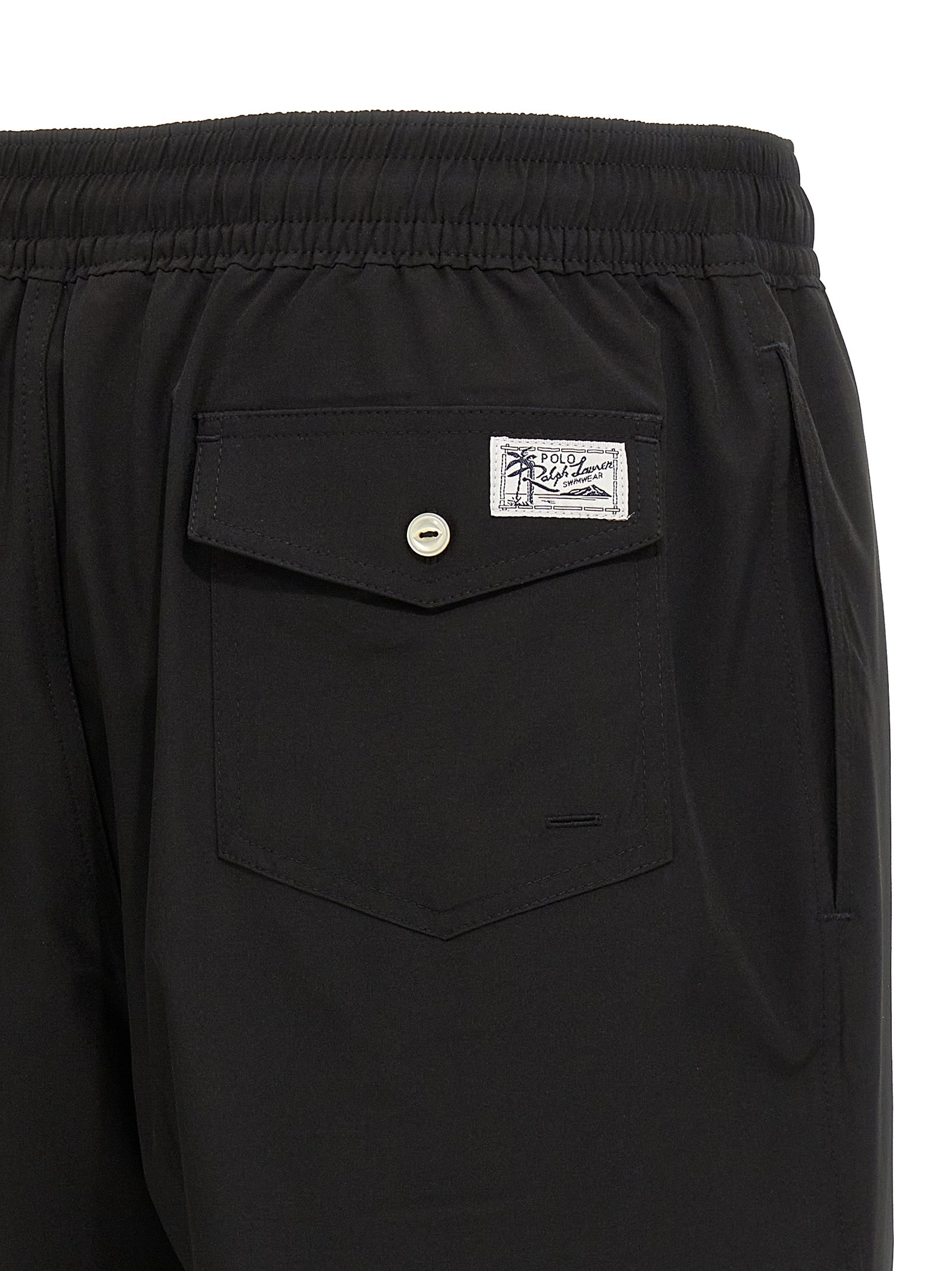Swim Shorts by Polo Ralph Lauren for men in stretch polyester mesh black features a resort ready silhouette, capturing the beach-ready style of the Men's Stretch Polyester Mesh Swim Shorts collection.