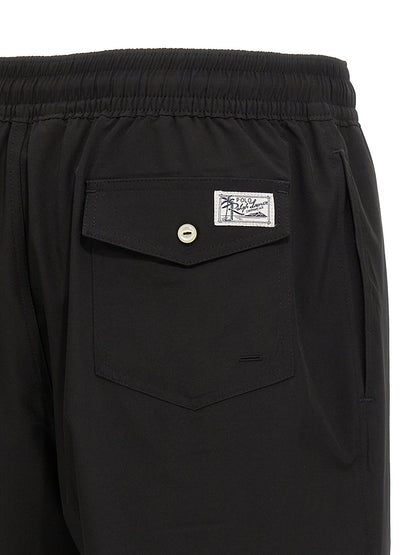 Swim Shorts by Polo Ralph Lauren for men in stretch polyester mesh black features a resort ready silhouette, capturing the beach-ready style of the Men's Stretch Polyester Mesh Swim Shorts collection.
