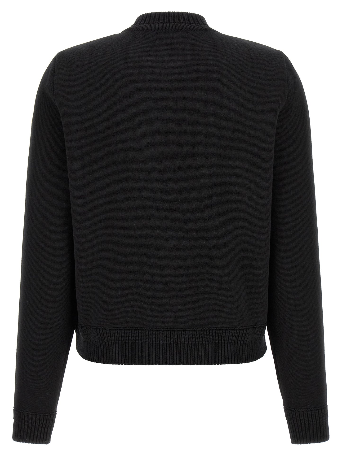 Cardigan by Moncler for women in plush nylon & cotton black & gold presents a textural silhouette, artfully finished with a textural and for a sophisticated, textural look.