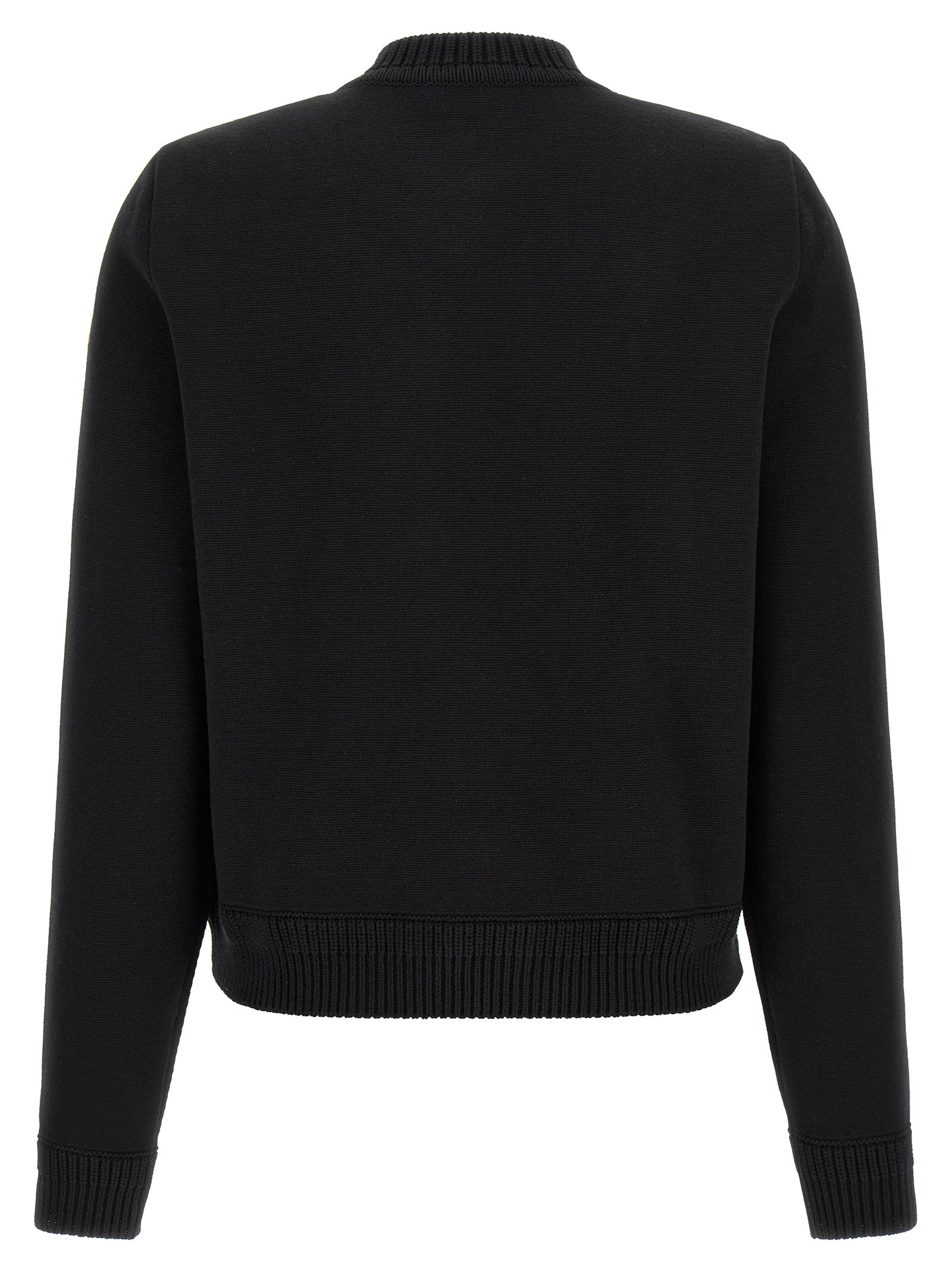 Cardigan by Moncler for women in plush nylon & cotton black & gold presents a textural silhouette, artfully finished with a textural and for a sophisticated, textural look.