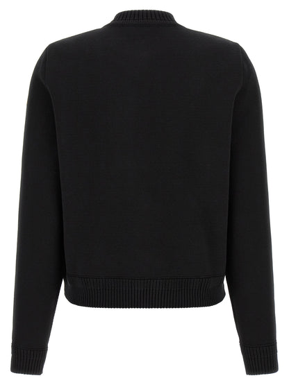 Cardigan by Moncler for women in plush nylon & cotton black & gold presents a textural silhouette, artfully finished with a textural and for a sophisticated, textural look.