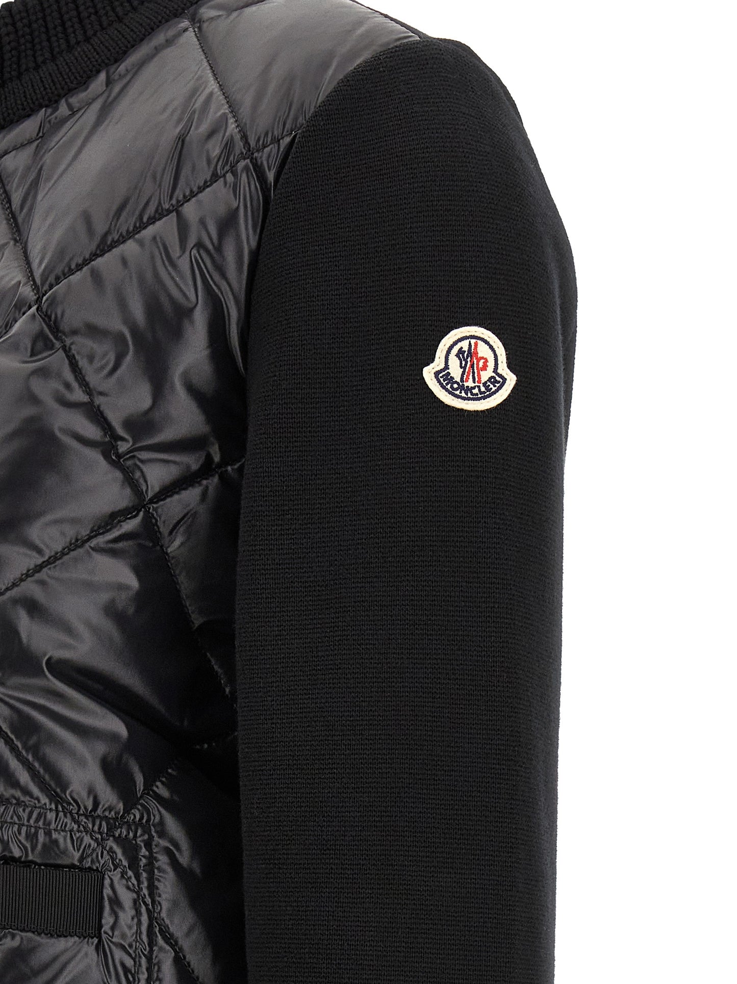 Cardigan by Moncler for women in plush nylon & cotton black & gold features an impeccable silhouette, showcasing a sophisticated and detail for a truly impeccable finish.
