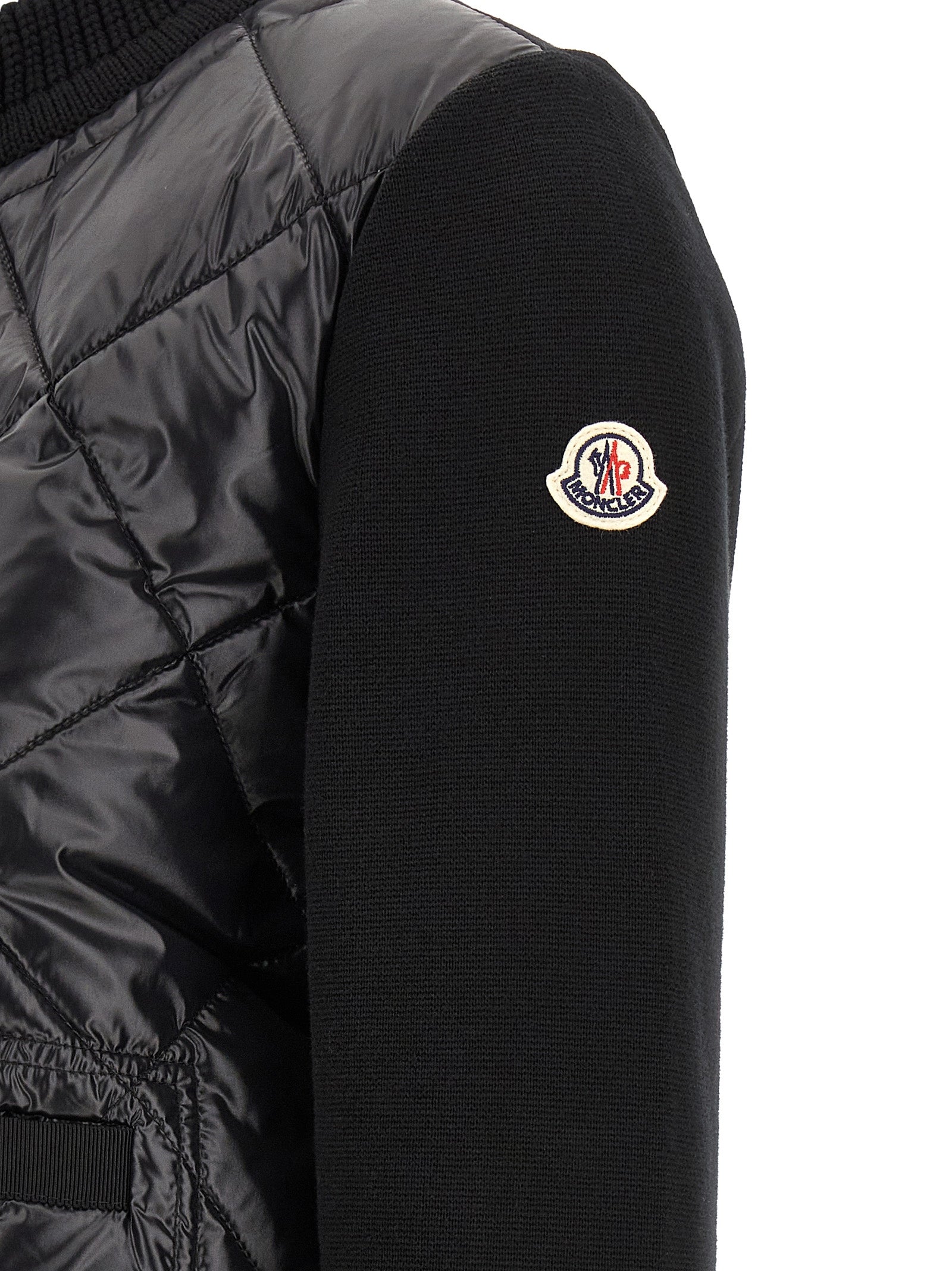 Cardigan by Moncler for women in plush nylon & cotton black & gold features an impeccable silhouette, showcasing a sophisticated and detail for a truly impeccable finish.