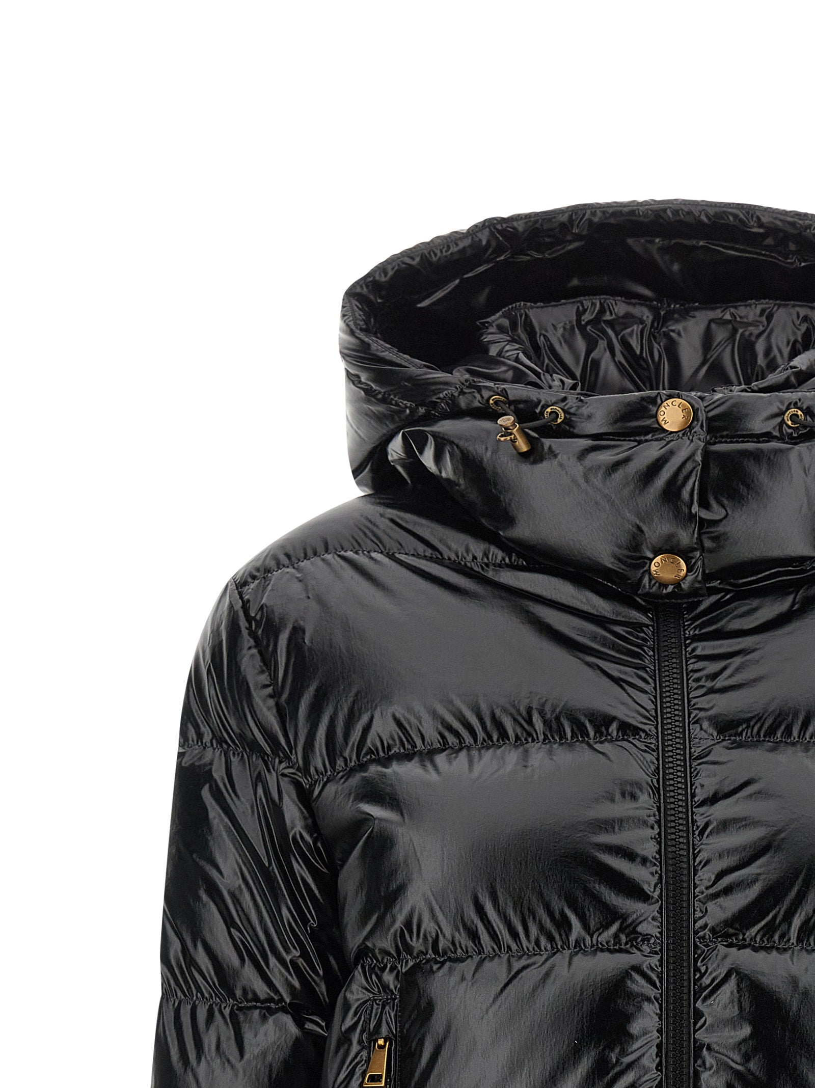 This Hooded Puffer Jacket by Moncler for women in polyamide & felt black & gold exhibits a edgy silhouette, meticulously detailed with functional hooded & insulated and a edgy hooded high-neck neckline for a edgy finish.