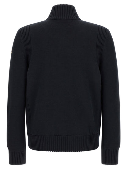 Cardigan by Moncler for men in virgin wool & polyester navy features an impeccable silhouette, showcasing a sophisticated high-neck neckline and detail for a truly impeccable finish.
