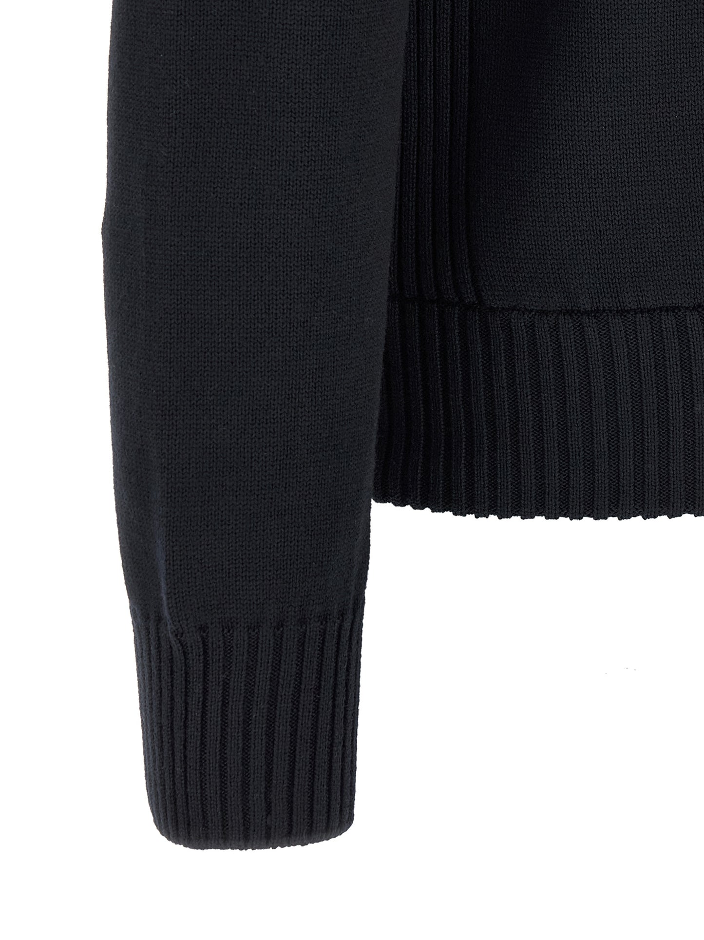Cardigan by Moncler for men in virgin wool & polyester navy showcases a luxurious silhouette, meticulously detailed with a sophisticated high-neck neckline and for a refined finish.