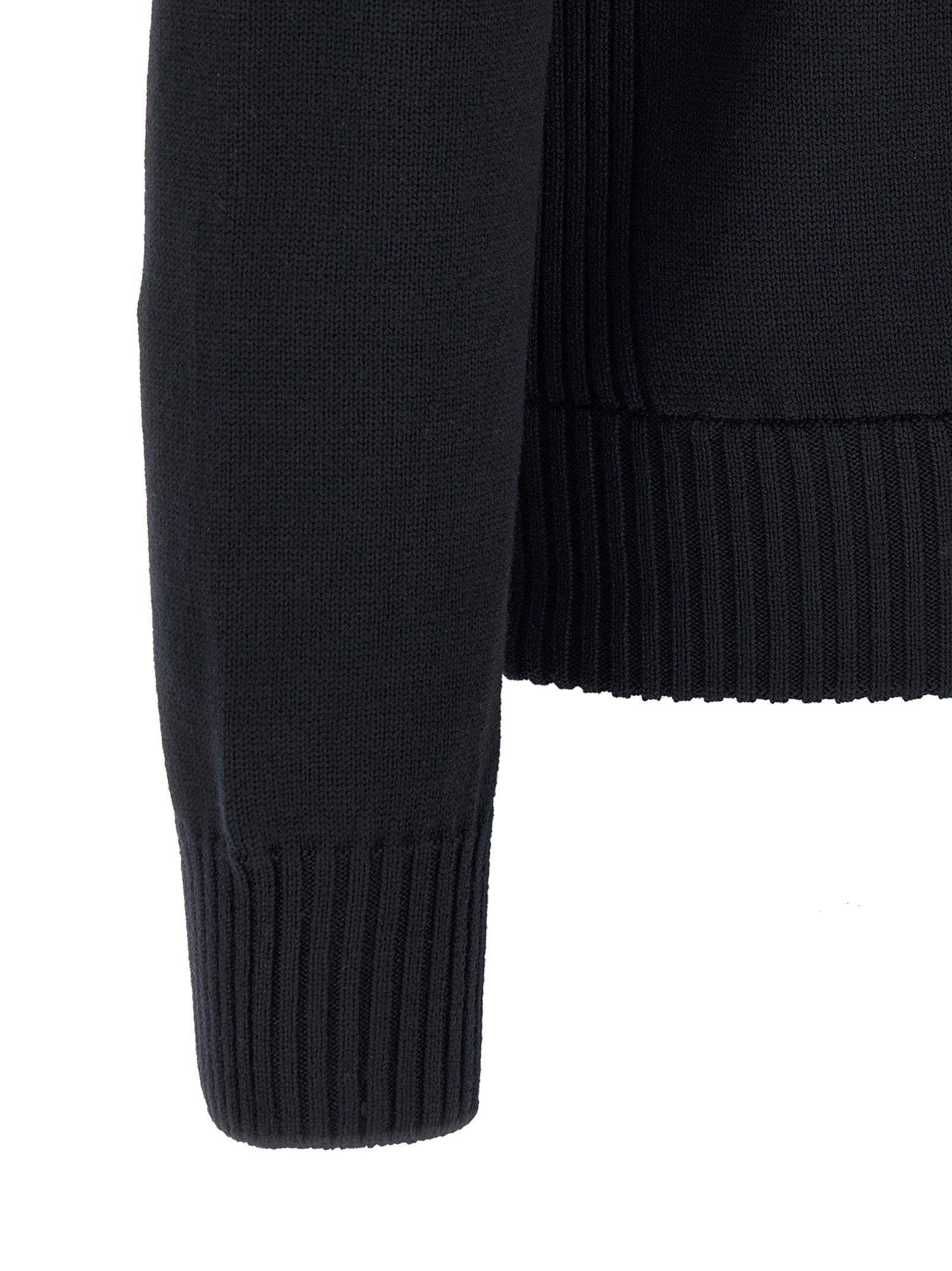 Cardigan by Moncler for men in virgin wool & polyester navy showcases a luxurious silhouette, meticulously detailed with a sophisticated high-neck neckline and for a refined finish.