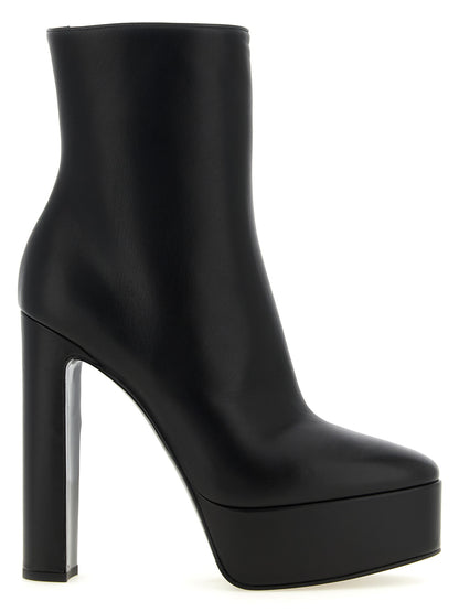 Platform Ankle Boots by LE SILLA for women in lamb leather black features an effortless chic silhouette from the Women's Lamb Leather Platform Ankle Boots collection, showcasing a effortless chic platform and refined almond toe style for an effortless chic look.