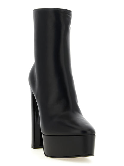 Platform Ankle Boots by LE SILLA for women in lamb leather black showcases a impeccable silhouette as Women's Lamb Leather Platform Ankle Boots, artfully defined by a impeccable platform and a impeccable almond toe style.