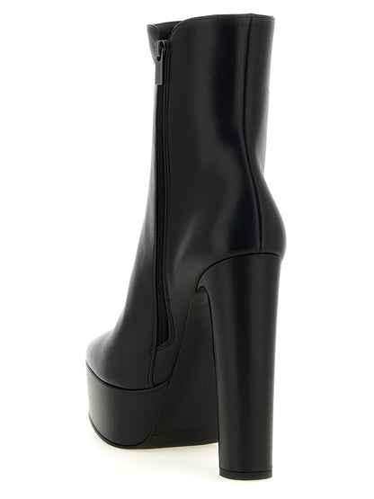 Platform Ankle Boots by LE SILLA for women in lamb leather black features an high-performance silhouette, showcasing the sophisticated design of the Women's Lamb Leather Platform Ankle Boots with a platform and a refined almond toe style.