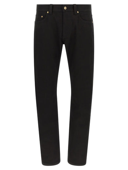 Jeans by Versace for men in stretch denim cotton black & gold features an refined tailoring silhouette, showcasing a premium straight-leg with a and long cut for a refined tailoring look.