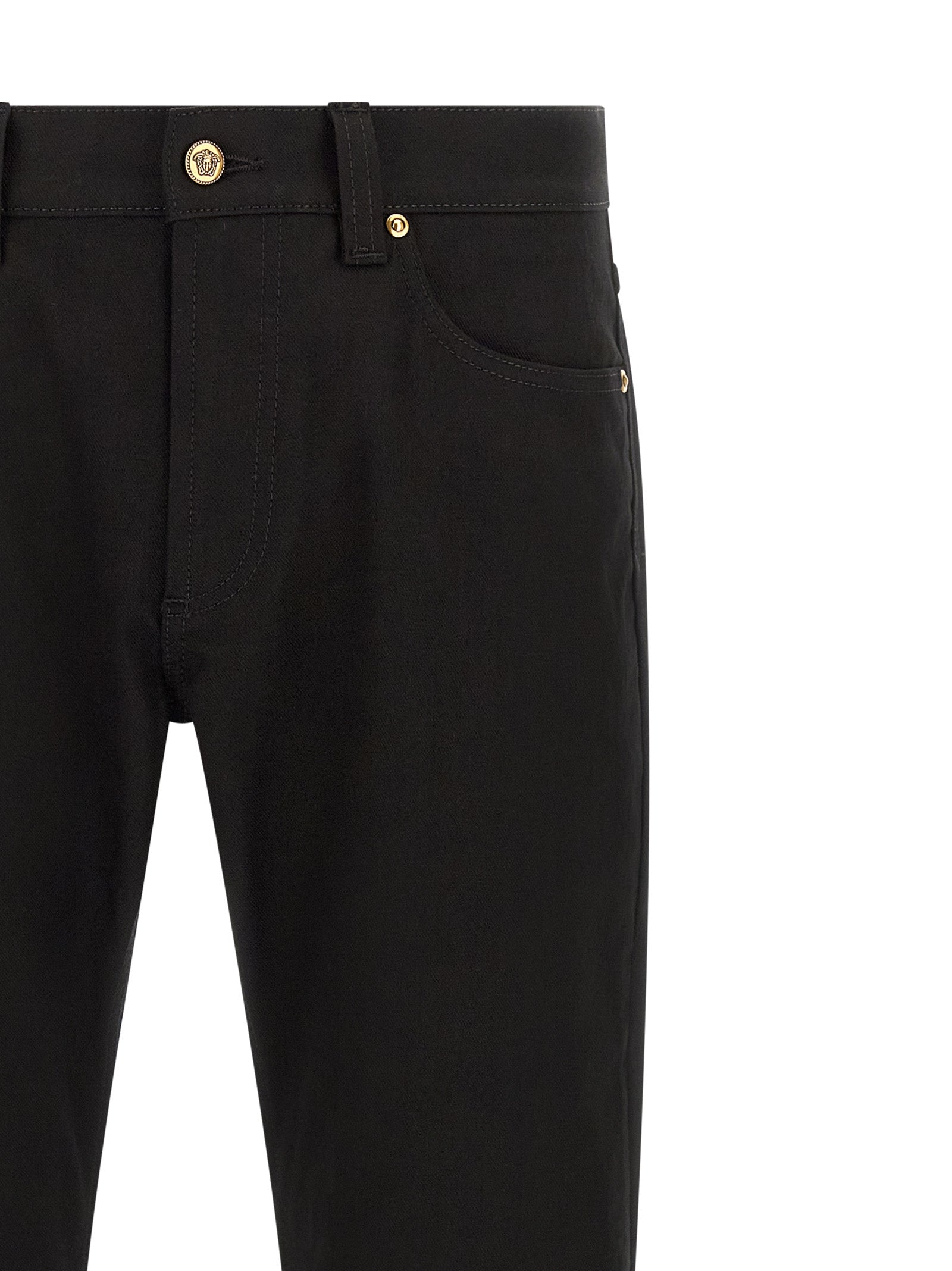 Jeans by Versace for men in stretch denim cotton black & gold presents a refined pantology silhouette, artfully defined by a refined pantology straight-leg, long, and a sophisticated .