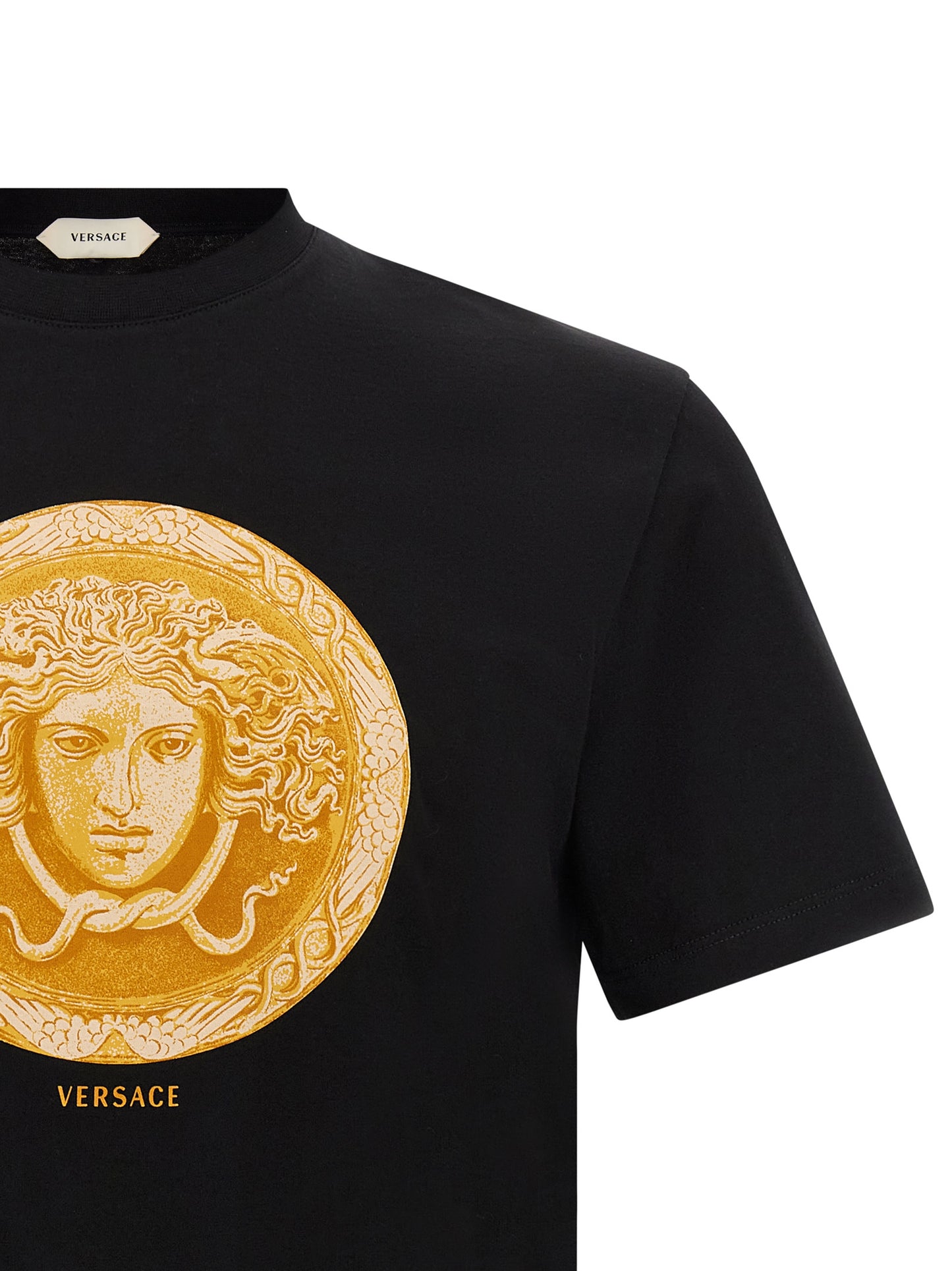 T-Shirt by Versace for men in cotton black, gold & print features an edgy silhouette, meticulously detailed with a sophisticated and round neckline for a truly edgy finish.