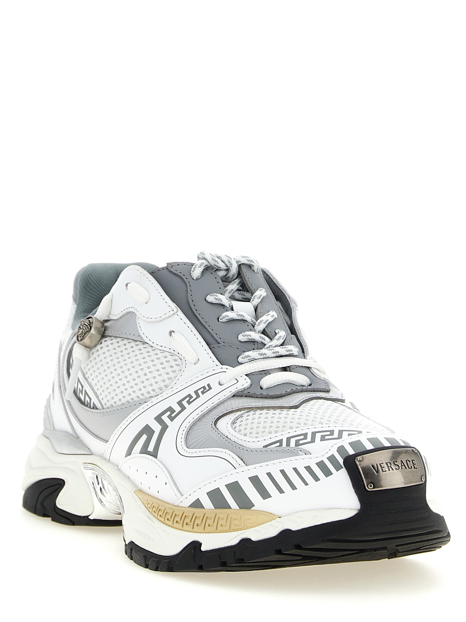 Sneakers by Versace for men in calfskin leather multicolor & silver features an versatile design from the Medusa Men's Chunky Calfskin Leather Sneakers collection, highlighting a versatile chunky style for a premium, high-fashion look.