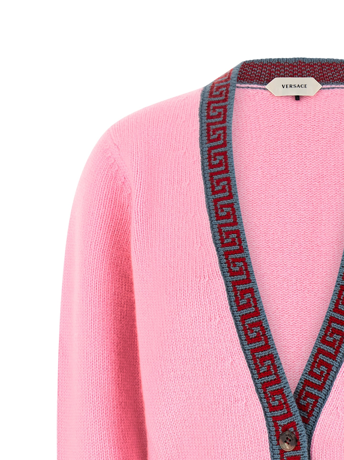 Cardigan by Versace for women in cashmere virgin wool multicolor, pink & jacquard showcases a luxurious silhouette, meticulously detailed with a sophisticated v-neck neckline and for a refined finish.