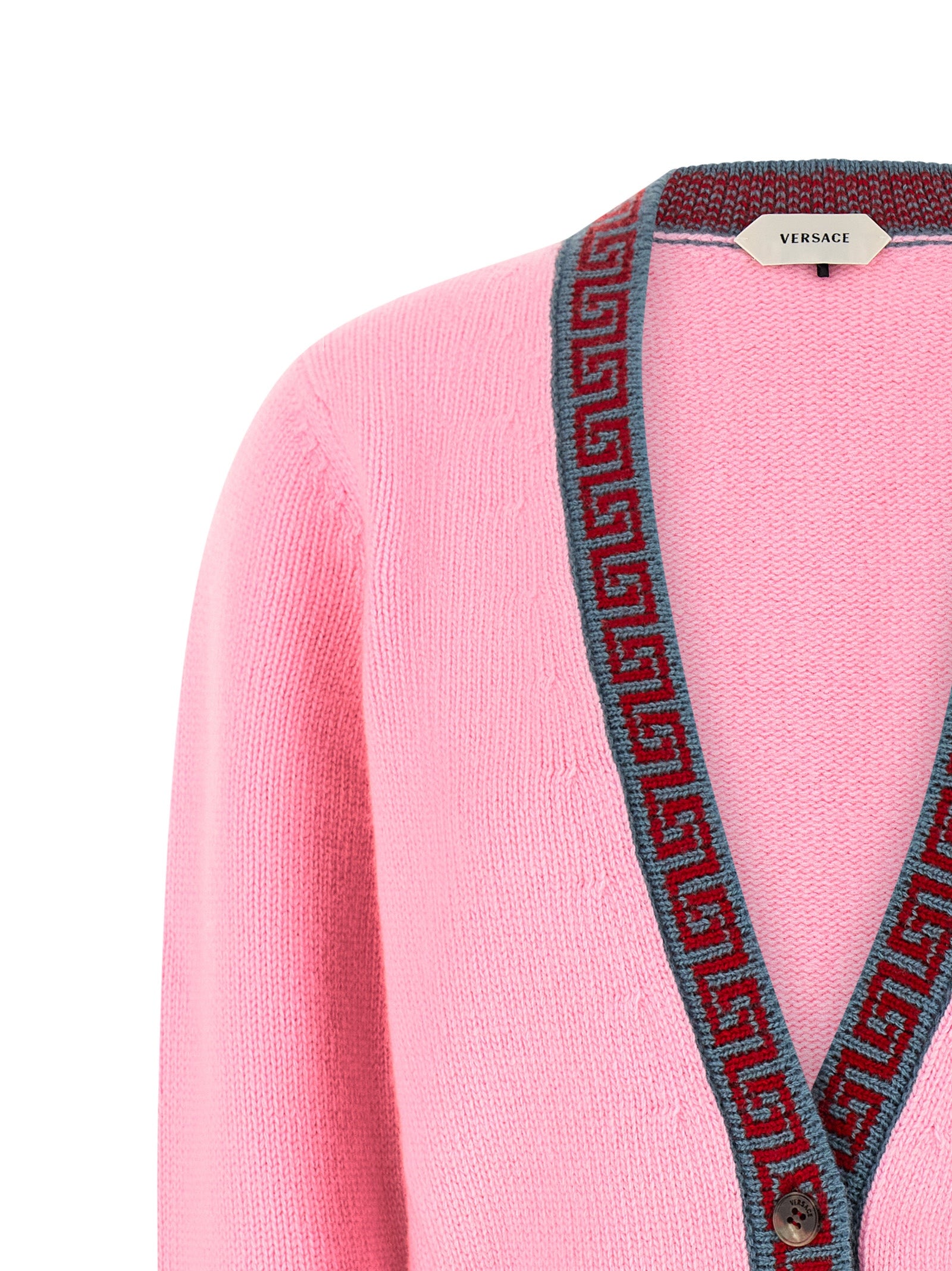 Cardigan by Versace for women in cashmere virgin wool multicolor, pink & jacquard showcases a luxurious silhouette, meticulously detailed with a sophisticated v-neck neckline and for a refined finish.
