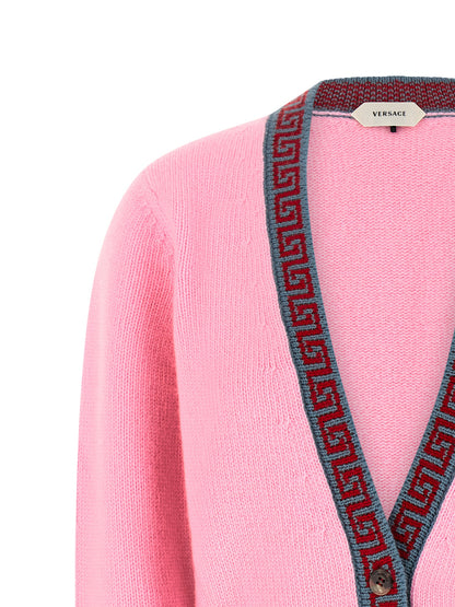 Cardigan by Versace for women in cashmere virgin wool multicolor, pink & jacquard showcases a luxurious silhouette, meticulously detailed with a sophisticated v-neck neckline and for a refined finish.