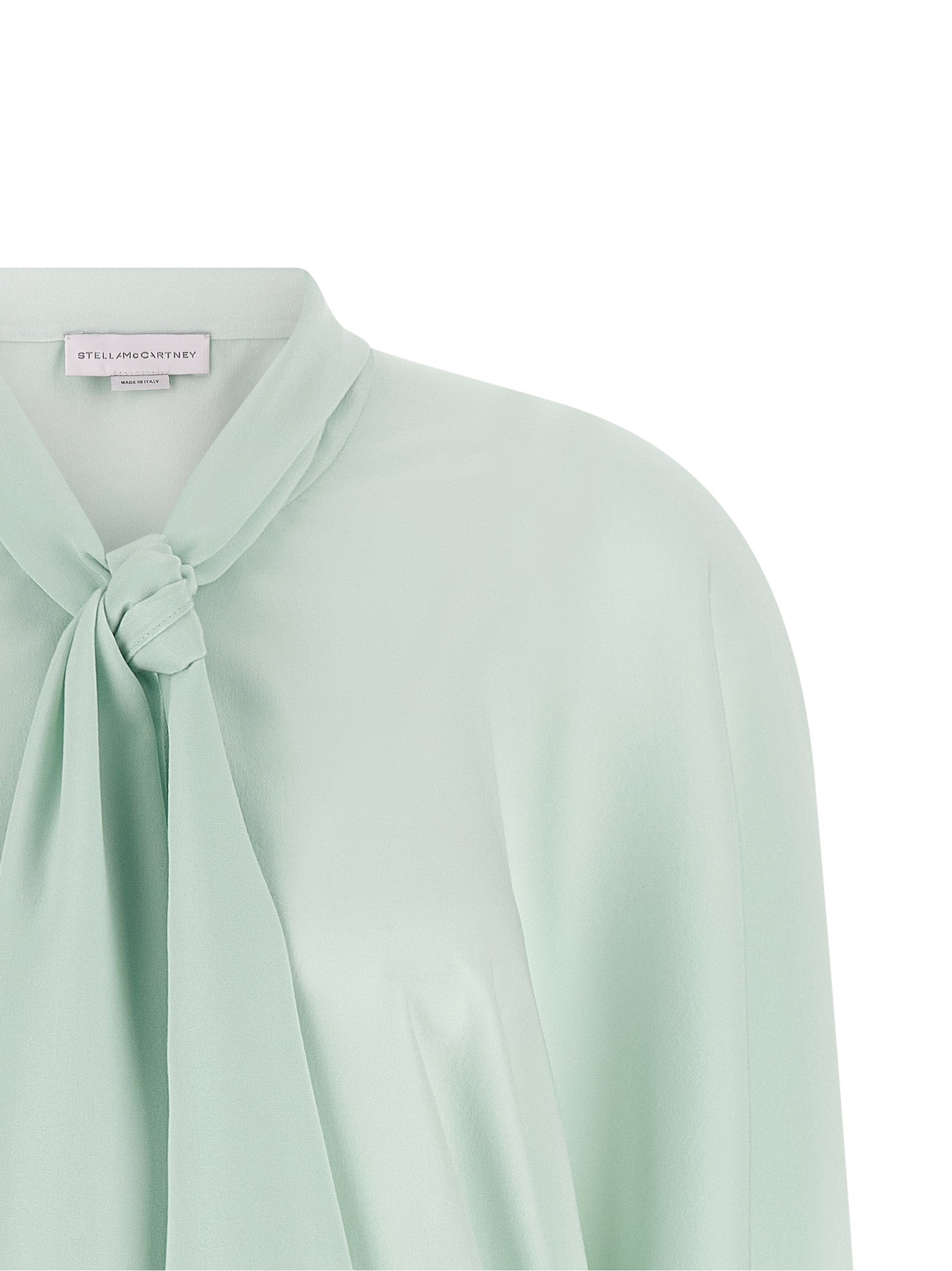 Blouse by Stella McCartney for women in silk bicolour & mint-green showcases a sharp silhouette, elegantly detailed with a sharp and sharp .