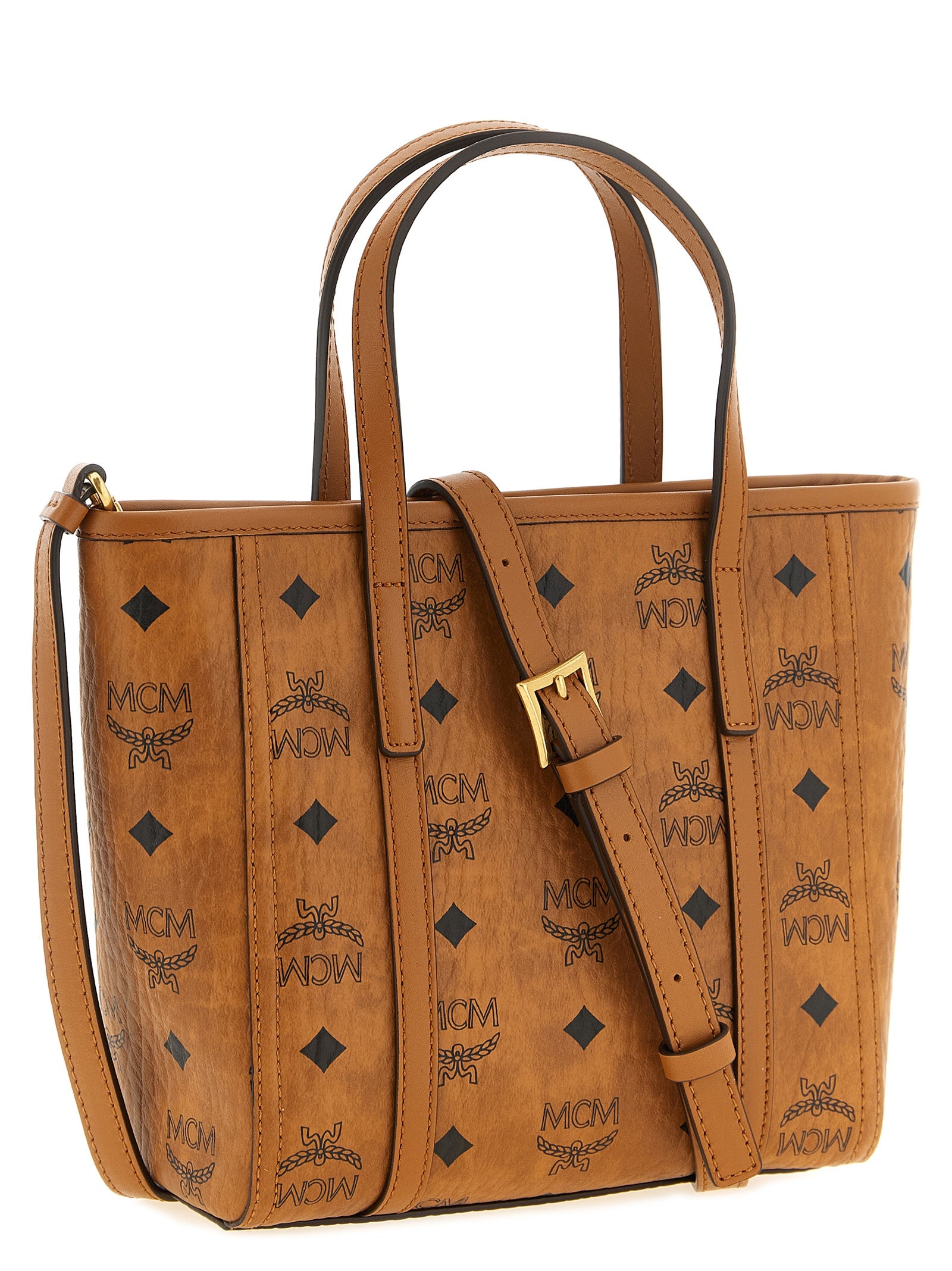 This Small Shopper Tote Bag by MCM for women in polyester polyethylene polyurethane leather brown, gold, signature & monogram features an on trend Visetos Polyester Polyethylene Polyurethane Leather Small Shopper Tote Bag design with a secure zipper, ample , and on trend shoulder-strap, handle & adjustable-strap.