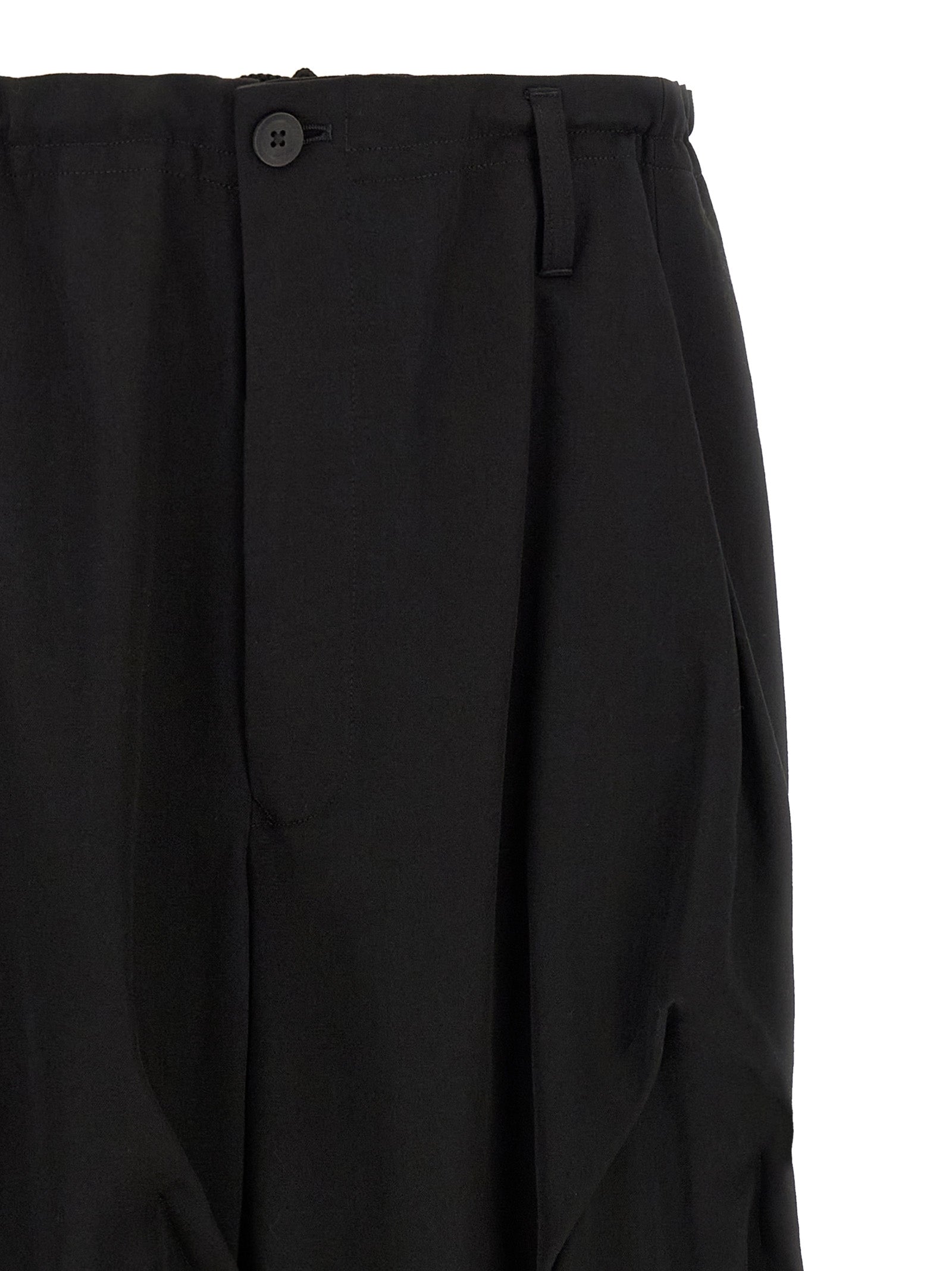 Casual Pants by Yohji Yamamoto for men in wool black features a refined silhouette with a refined wide, defined by a and a refined long for a refined finish.