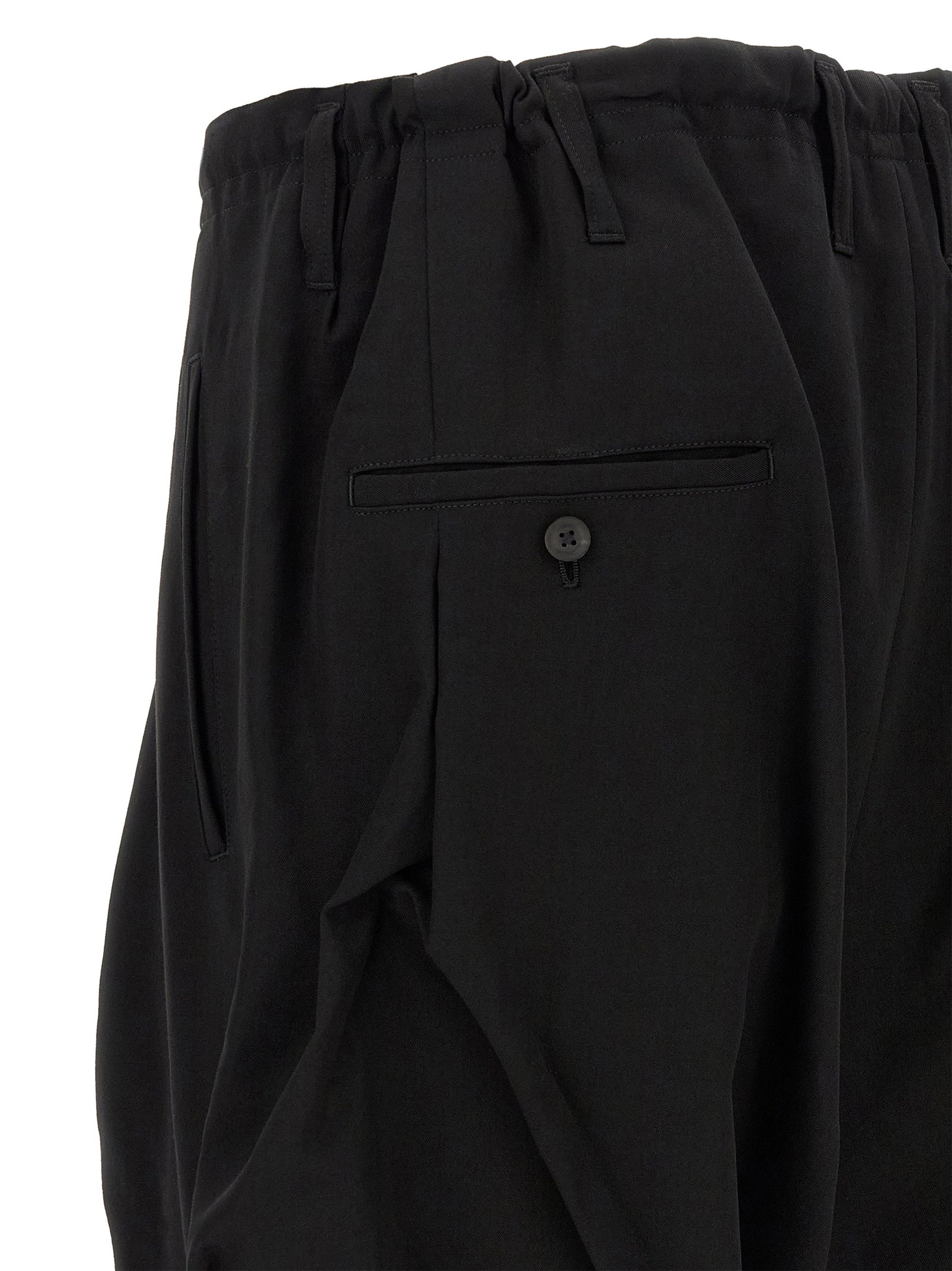 Casual Pants by Yohji Yamamoto for men in wool black features an refined tailoring silhouette, showcasing a premium wide with a and long cut for a refined tailoring look.
