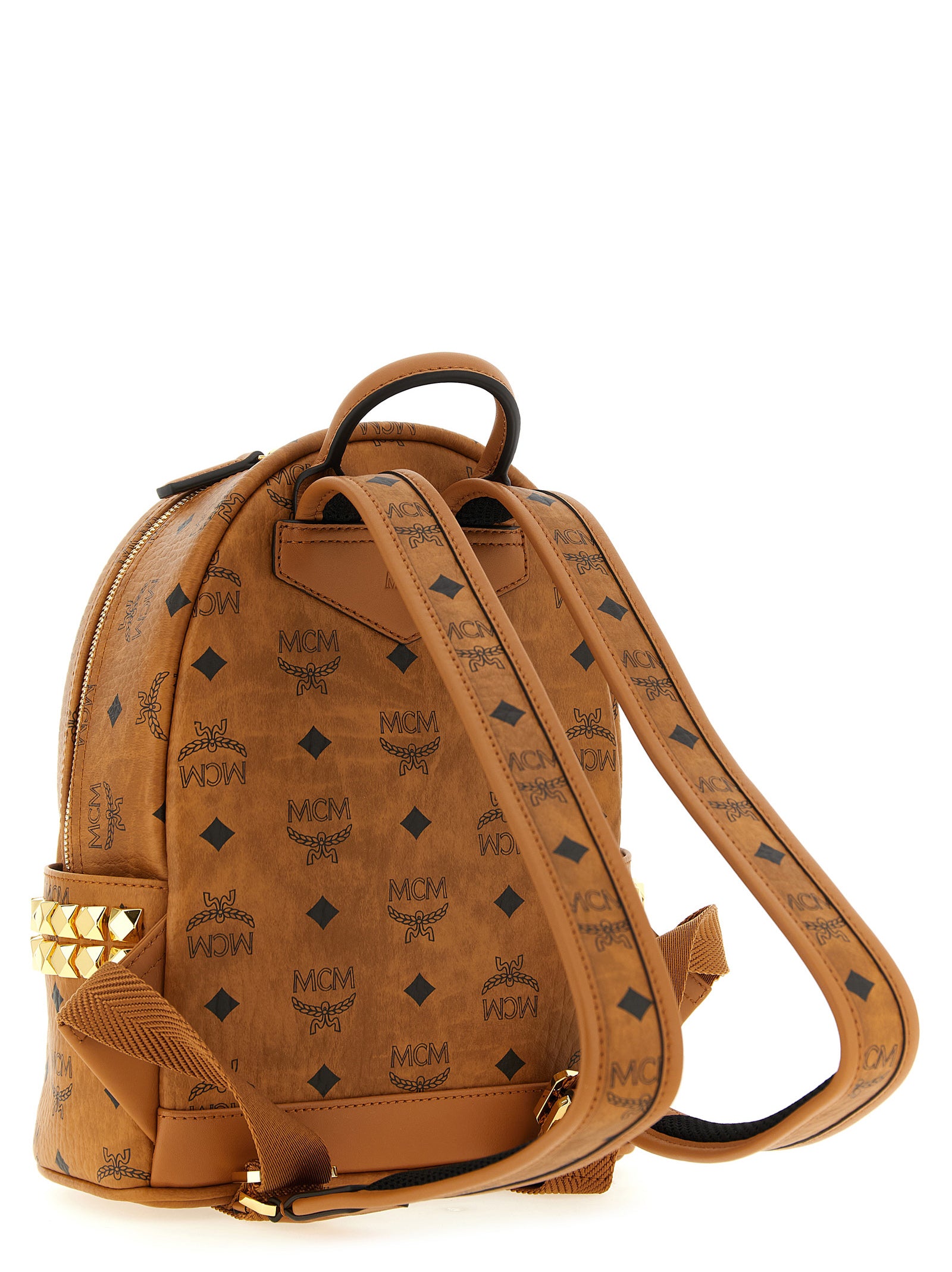 Mini Backpack by MCM for women in nappa polyester polyethylene polyurethane leather brown, gold & monogram showcases an architectural Visetos Nappa Polyester Polyethylene Polyurethane Leather Mini Backpack design, featuring a secure , ample , and architectural backpack-strap & adjustable-strap for a sophisticated look.
