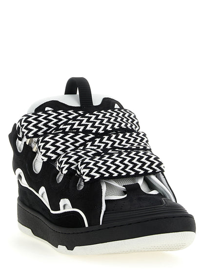 Sneakers by Lanvin for men in polyester & suede calfskin leather bicolour, black, white & herringbone presents a impeccable silhouette as Men's Chunky Polyester & Suede Calfskin Leather Sneakers, expertly defined by a impeccable chunky style for a impeccable, high-fashion look.
