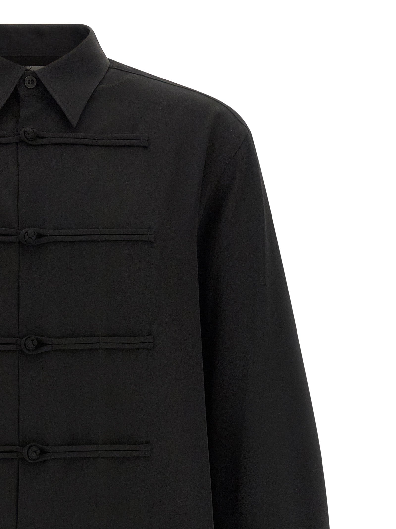 Shirt by Yohji Yamamoto for men in wool black showcases a sharp silhouette, elegantly detailed with a sharp and sharp .