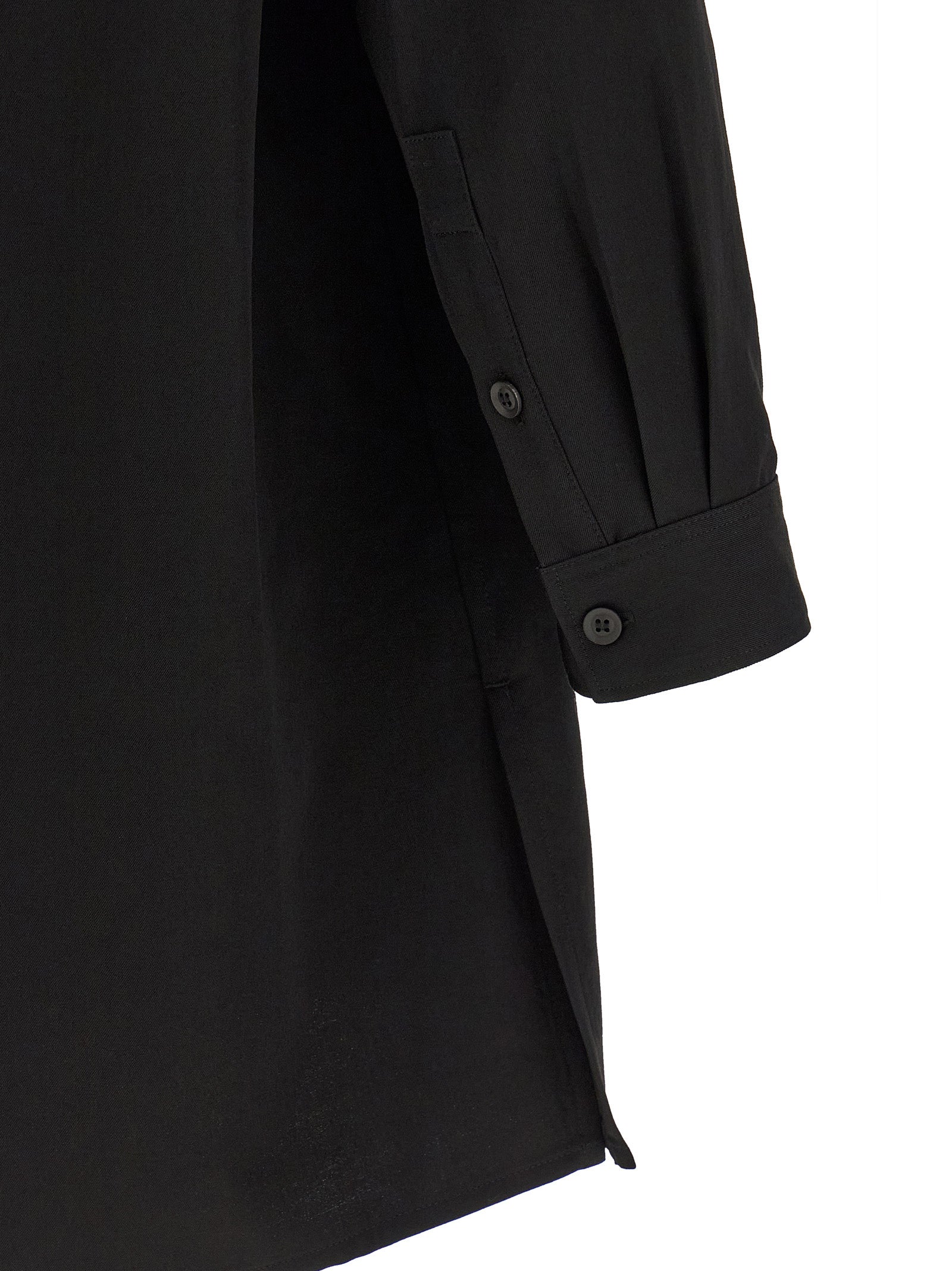 Shirt by Yohji Yamamoto for men in wool black presents a discerning silhouette, showcasing a sophisticated and for a truly discerning finish.
