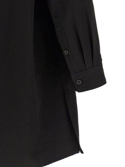 Shirt by Yohji Yamamoto for men in wool black presents a discerning silhouette, showcasing a sophisticated and for a truly discerning finish.