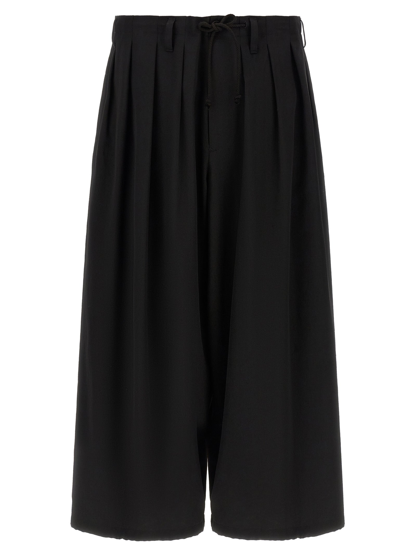 Trousers by Yohji Yamamoto for men in wool black presents a smart silhouette, meticulously detailed with a smart wide, a smart long, and a smart .