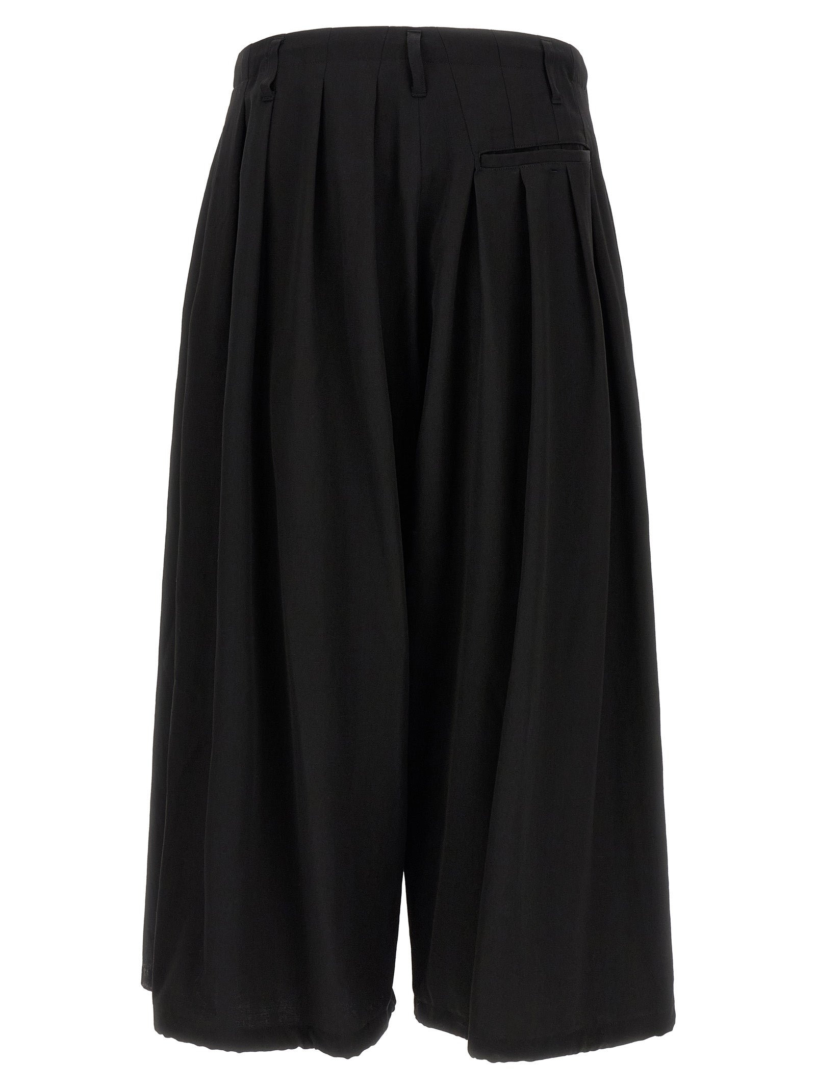 Trousers by Yohji Yamamoto for men in wool black features an on trend silhouette, showcasing a sophisticated wide with a long and for an on trend finish.