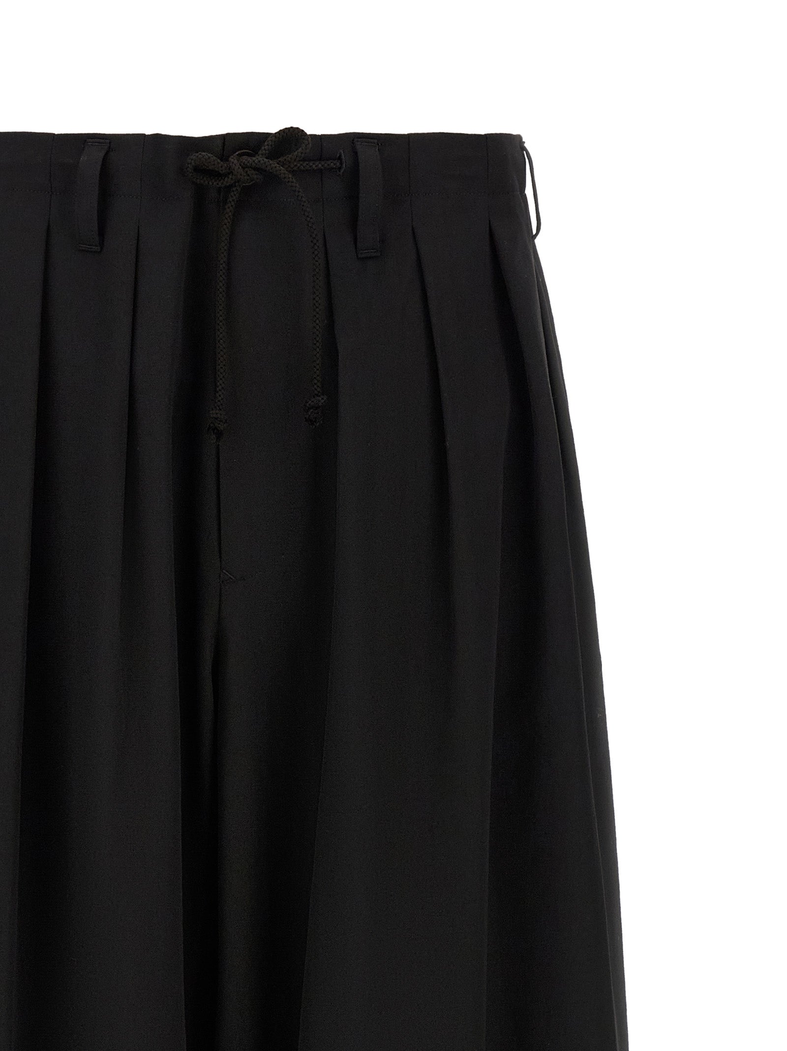 Trousers by Yohji Yamamoto for men in wool black features an sartorial silhouette, showcasing a precise wide and long with a sartorial for a refined look.