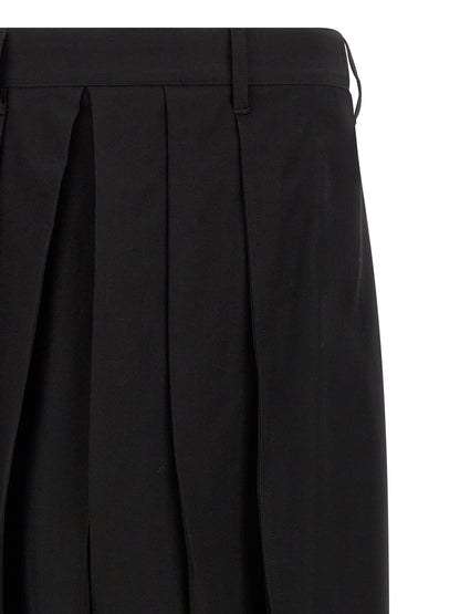 Trousers by Yohji Yamamoto for men in wool black features an sartorial silhouette, showcasing a precise wide and long with a sartorial for a refined look.