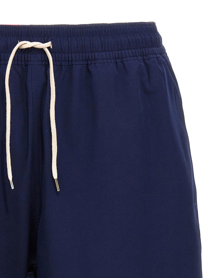 Swim Shorts by Polo Ralph Lauren for men in stretch polyester mesh blue features a magnificent design, channeling the luxury vibe of Waves Men's Stretch Polyester Mesh Swim Shorts.