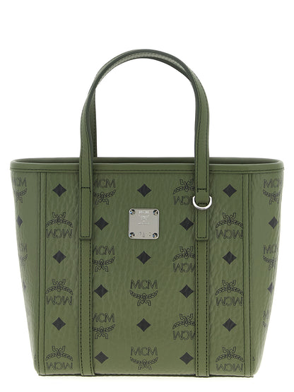 Mini Shopper Tote Bag by MCM for women in poly cotton canvas bicolour, green & monogram features an metropolitan chic Icon Visetos Poly Cotton Canvas Mini Shopper Tote Bag design with a secure zipper, metropolitan chic , and versatile shoulder-strap, adjustable-strap & handle for a metropolitan chic look.