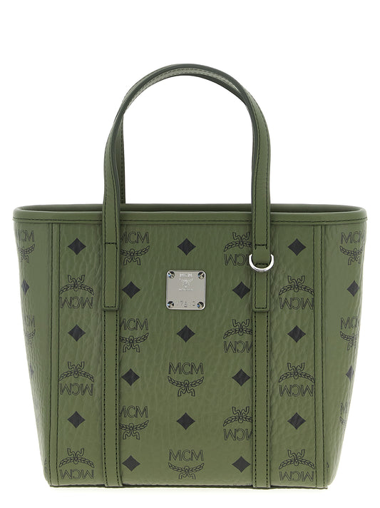 Mini Shopper Tote Bag by MCM for women in poly cotton canvas bicolour, green & monogram features an metropolitan chic Icon Visetos Poly Cotton Canvas Mini Shopper Tote Bag design with a secure zipper, metropolitan chic , and versatile shoulder-strap, adjustable-strap & handle for a metropolitan chic look.