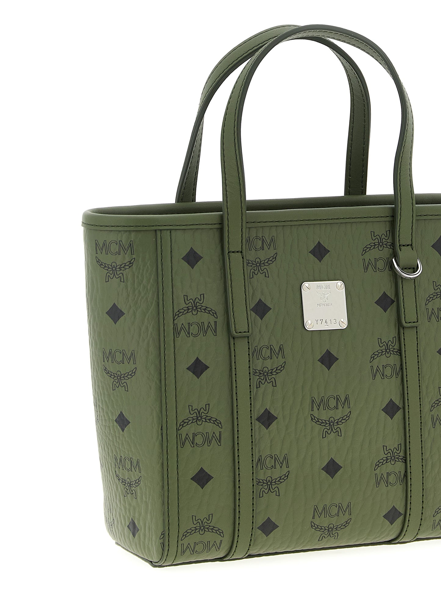 This Mini Shopper Tote Bag by MCM for women in poly cotton canvas bicolour, green & monogram features an on trend Icon Visetos Poly Cotton Canvas Mini Shopper Tote Bag design with a secure zipper, ample , and on trend shoulder-strap, adjustable-strap & handle.