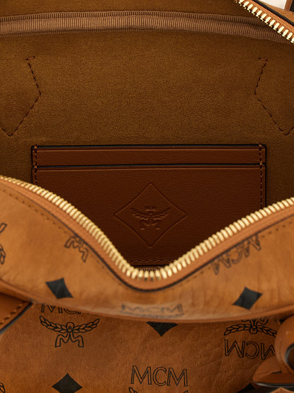 East West Shoulder Bag by MCM for women in suede polyester polyethylene polyurethane leather brown & natural features an effortlessly chic silhouette with a secure zipper, ample , and versatile shoulder-strap for effortlessly chic everyday luxury.