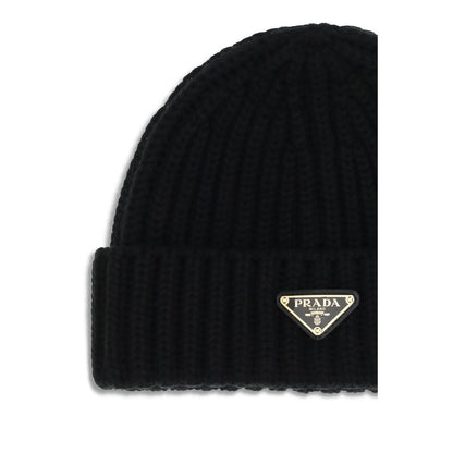 Beanie Hat by Prada for women in virgin wool black presents a sleek silhouette, showcasing the sleek texture and refined craftsmanship of the Virgin Wool Beanie Hat collection.