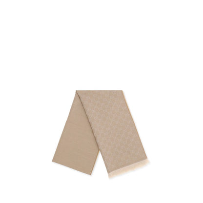 Scarf by Gucci for women in wool beige showcases a warm silhouette from the Gg Wool Foulard Frayed-Edge Scarf collection, offering a warm drape that exudes sophisticated luxury.
