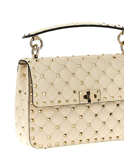 Shoulder Flap Bag by Valentino Garavani for women in lamb leather white features an effortlessly chic silhouette with a secure flap, ample , and versatile shoulder-strap & handle for effortlessly chic everyday luxury.