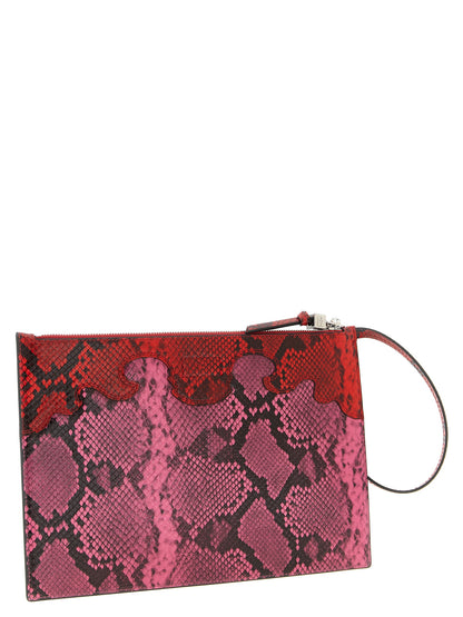 Pouch Clutch Handbag by Ganni for women in polyester & polyurethane fuchsia & print features a architectural silhouette, showcasing a secure snap, zipper & hook, ample , and versatile for a architectural finish.